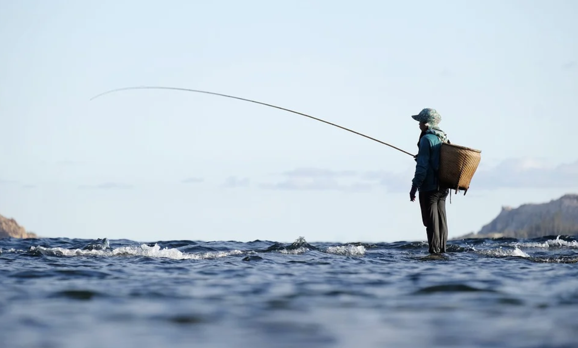 rybařící muž